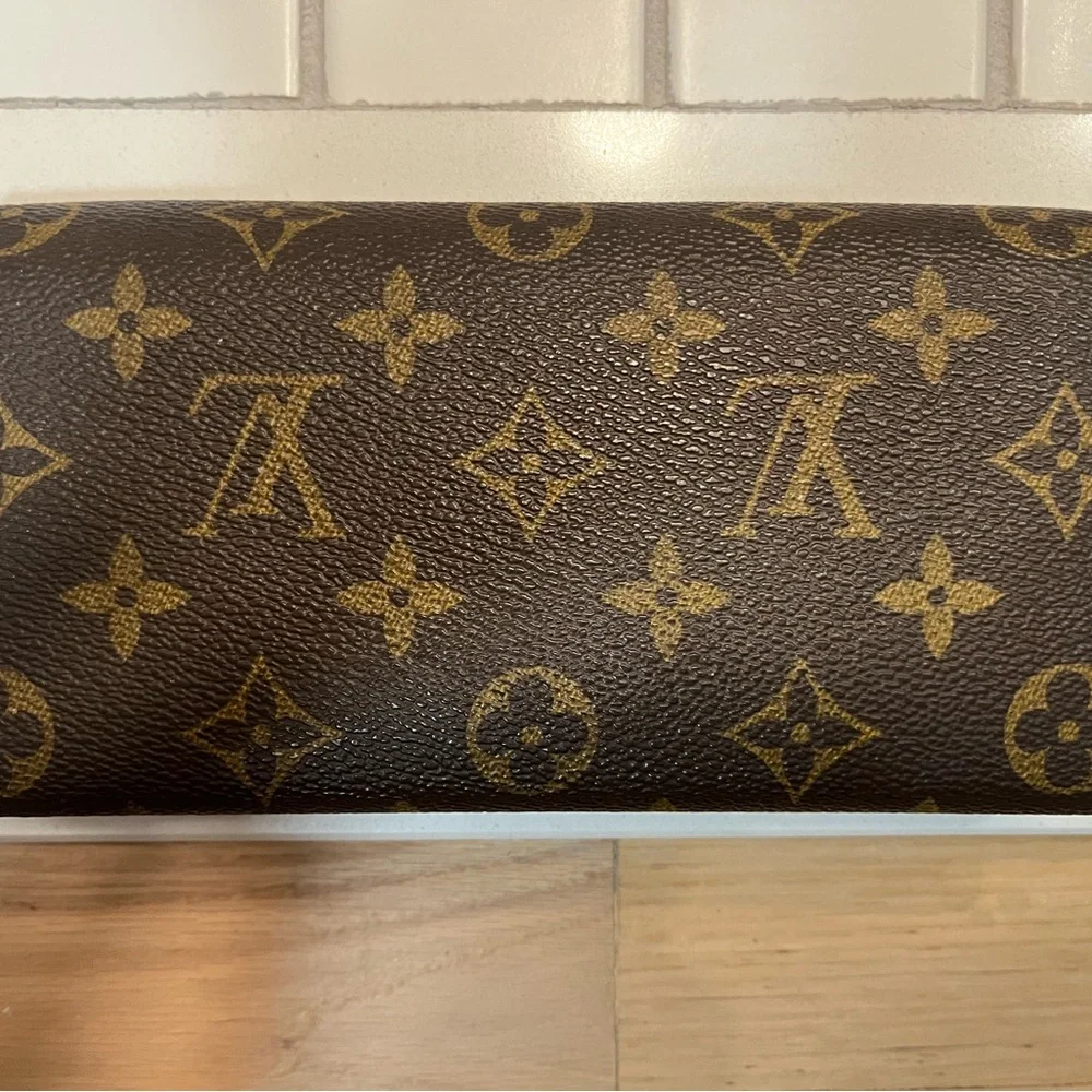 Louis Vuitton Monogram Canvas Trifold Wallet with Red Snap